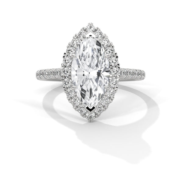 “Celestia Ring—marquise diamond brilliance, radiant halo sparkle, and pavé white-gold elegance crafted to symbolize timeless love, luxury, and unforgettable moments.”