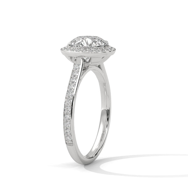 “Dazzling round halo engagement ring with pavédiamonds, premium white gold design, and brilliant sparkle—crafted for timeless luxury and unforgettable proposals.”