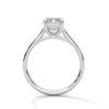 The Celestial Elegance Ring features a striking emerald-cut diamond embraced by a delicate band adorned with shimmering pave stones. A timeless piece that symbolizes everlasting love and sophistication.
