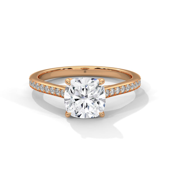 “Cushion-cut diamond solitaire ring in white gold—brilliant sparkle, pavé band elegance,and timeless luxury crafted for everlasting love.”
