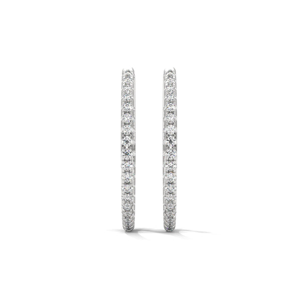Classic hoops reimagined with a luminous row of diamonds—endless style, infinite sparkle.