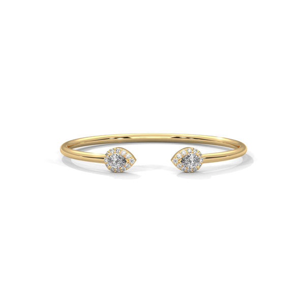 Gracefully curved and brilliantly adorned, the Luna Embrace bangle bracelet features 3.45 carats of oval-shaped diamonds in a 7-inch design—timeless elegance with a bold twist.
