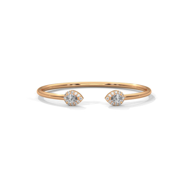 Gracefully curved and brilliantly adorned, the Luna Embrace bangle bracelet features 3.45 carats of oval-shaped diamonds in a 7-inch design—timeless elegance with a bold twist.