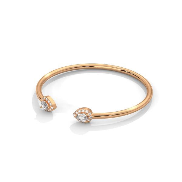 Gracefully curved and brilliantly adorned, the Luna Embrace bangle bracelet features 3.45 carats of oval-shaped diamonds in a 7-inch design—timeless elegance with a bold twist.