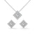 A striking rose gold jewelry set featuring square princess-cut diamonds framed in radiant round halos, combining sharp sophistication with brilliant sparkle.