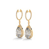 Dramatic rose gold danglers with pear-shaped centerpieces and a cascade of diamonds for breathtaking brilliance.