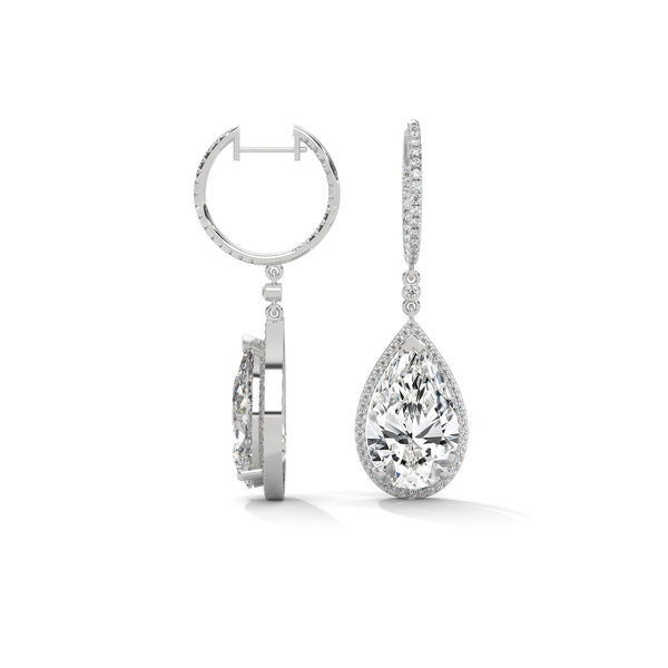 Dramatic rose gold danglers with pear-shaped centerpieces and a cascade of diamonds for breathtaking brilliance.