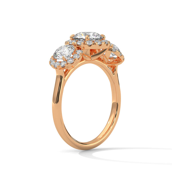 “Celebrate everlasting love with a three-stonehalo diamond ring that shines with brilliant sparkle, luxury craftsmanship, and timeless elegance.”