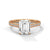 The Celestial Elegance Ring features a striking emerald-cut diamond embraced by a delicate band adorned with shimmering pave stones. A timeless piece that symbolizes everlasting love and sophistication.