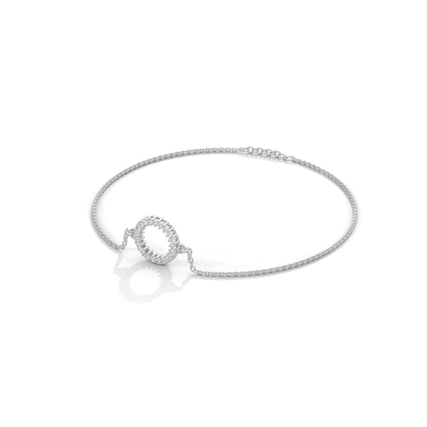 A dazzling bangle bracelet featuring 2 multi-shaped diamonds, totaling 0.50 carats. With a 7-inch length, it offers a refined, versatile look that adds a touch of elegance to any occasion.
