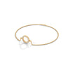 A dazzling bangle bracelet featuring 2 multi-shaped diamonds, totaling 0.50 carats. With a 7-inch length, it offers a refined, versatile look that adds a touch of elegance to any occasion.