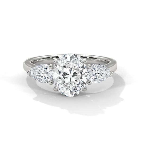 “Radiant Eternity Ring—oval brilliance, pear-diamond elegance, and platinum luxury crafted to symbolize everlasting love, timeless beauty, and unforgettable milestone moments.”