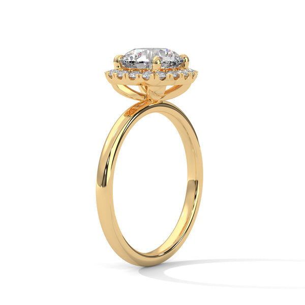 “Aurielle Ring—round-diamond brilliance, cushion-halo elegance, and sleek white-gold luxury crafted to symbolize timeless love, modern charm, and unforgettable moments.”