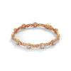 This exquisite tennis bracelet features 62 emerald-shaped diamonds, totaling 7.01 carats. With a 6.50-inch length, it is a stunning accessory that offers a perfect balance of brilliance and sophistication.