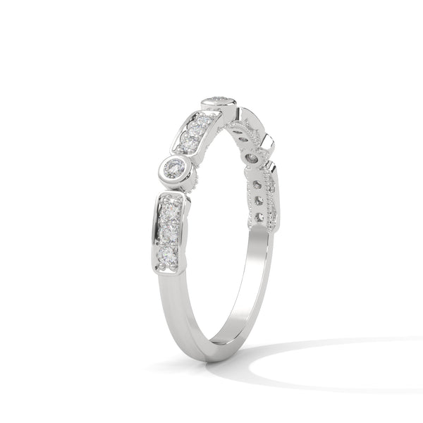 A whimsical yellow gold band featuring alternating bezel and pavé-set diamonds, creating a playful, elegant sparkle.
