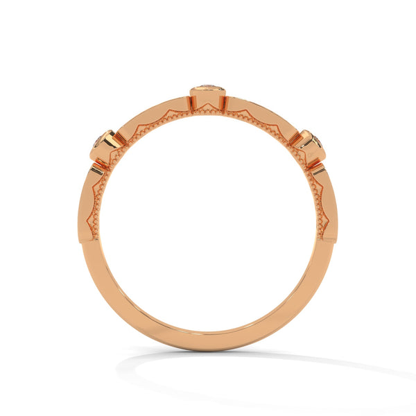 A whimsical yellow gold band featuring alternating bezel and pavé-set diamonds, creating a playful, elegant sparkle.