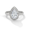 “Celeste Ring—pear-shaped diamond brilliance, radiant halo sparkle, and modern white-gold elegance crafted to symbolize celestial beauty, timeless love, and unforgettable moments.”
