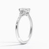 An elegant three-stone ring featuring a radiant oval center gem embraced by soft pear-cut side stones.