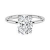 Celestia Crest features a stunning oval diamond elevated by a hidden halo and intricate claw prongs, set atop a high-polish band for a flawless blend of sparkle and sophistication.