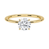 Celestia Crown radiates refined luxury, with a hidden halo of diamonds encircling the base of a dazzling round center stone in a sleek white metal setting.