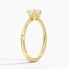 Solenya Whisper is a sleek, minimalist solitaire ring that blends subtle elegance with enduring craftsmanship, letting its brilliant center diamond speak volumes.