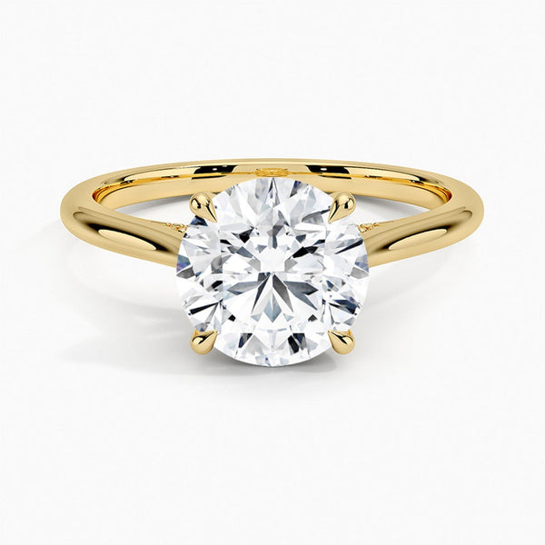 A sweeping cathedral-style solitaire ring with hidden diamond accents and a round brilliant center, blending elegance and modern refinement.
