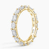 "Luxurious oval and emerald-cut diamond eternity ring crafted in radiant white gold, delivering timeless brilliance, elite craftsmanship, and unmatched elegance."