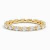 “Elegant pear-shaped diamond eternity ring in yellow gold, crafted for timeless brilliance, luxurious sparkle, and perfect everyday or bridal elegance.”
