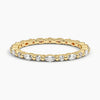 “Elegant diamond eternity band featuring marquise and round stones in sleek white gold, delivering timeless sparkle, refined style, and luxurious brilliance.”