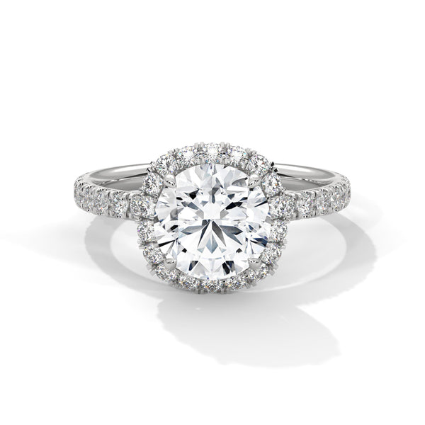 “Celestial Radiance Ring—brilliant center diamond, pavé halo sparkle, and timeless elegance crafted to symbolize everlasting love, luxury, and unforgettable romantic moments.”