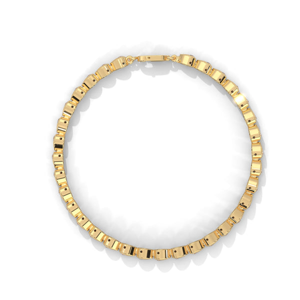 This luxurious tennis bracelet features 40 emerald-shaped diamonds, totaling 14.55 carats. With a 7-inch length, it offers an elegant, timeless design that adds exceptional brilliance to any occasion.