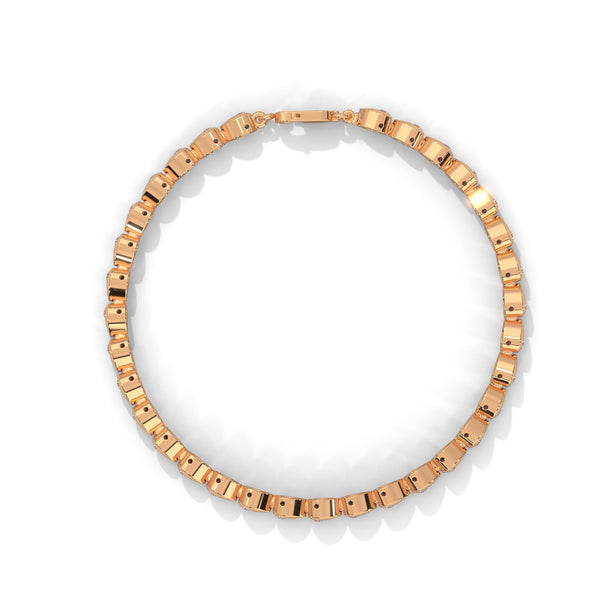 This luxurious tennis bracelet features 40 emerald-shaped diamonds, totaling 14.55 carats. With a 7-inch length, it offers an elegant, timeless design that adds exceptional brilliance to any occasion.