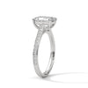 The Celestial Elegance Ring features a striking emerald-cut diamond embraced by a delicate band adorned with shimmering pave stones. A timeless piece that symbolizes everlasting love and sophistication.
