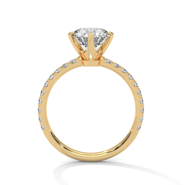 “Celestia Ring—round-cut diamond brilliance, secure six-prong elegance, and pavé-band sparkle crafted to symbolize timeless beauty, lasting love, and radiant sophistication.”