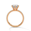 “Celestia Ring—round-cut diamond brilliance, secure six-prong elegance, and pavé-band sparkle crafted to symbolize timeless beauty, lasting love, and radiant sophistication.”
