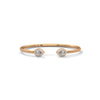 Gracefully curved and brilliantly adorned, the Luna Embrace bangle bracelet features 3.45 carats of oval-shaped diamonds in a 7-inch design—timeless elegance with a bold twist.