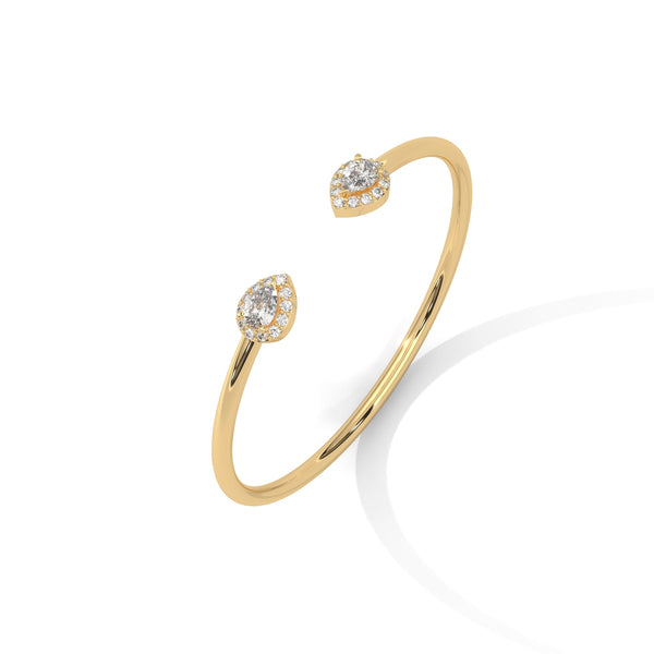Gracefully curved and brilliantly adorned, the Luna Embrace bangle bracelet features 3.45 carats of oval-shaped diamonds in a 7-inch design—timeless elegance with a bold twist.