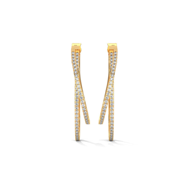 Stylishly layered gold hoops, adorned with sparkling diamonds for a bold yet elegant statement.