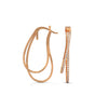 Stylishly layered gold hoops, adorned with sparkling diamonds for a bold yet elegant statement.