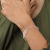 A captivating bangle bracelet adorned with 199 round-shaped diamonds totaling 1.00 carat. Its 6.50-inch length ensures a perfect fit, radiating sophistication and brilliance.
