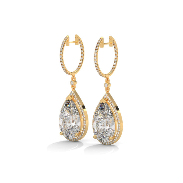 Dramatic rose gold danglers with pear-shaped centerpieces and a cascade of diamonds for breathtaking brilliance.