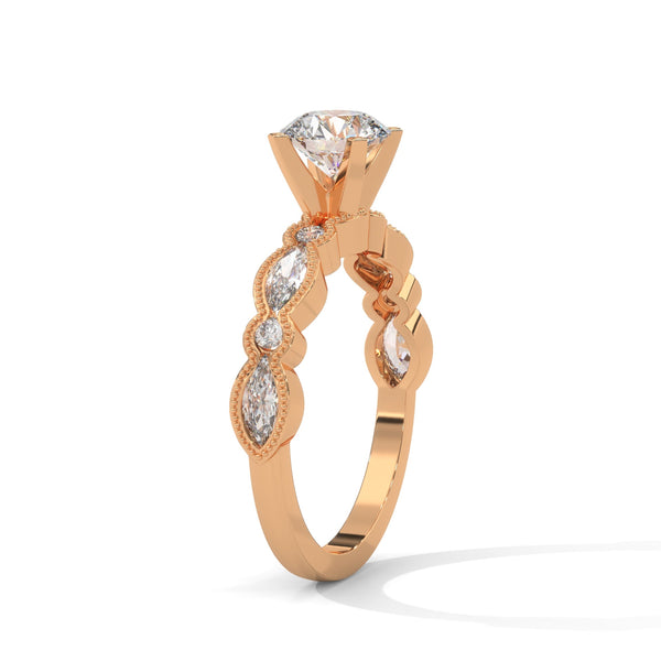 A rose gold solitaire with milgrain detailing and alternating marquise and round diamonds, capturing timeless elegance with every glance.
