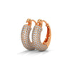 Bold gold hoop earrings encrusted with brilliant pavé diamonds and crowned with fierce panther heads.