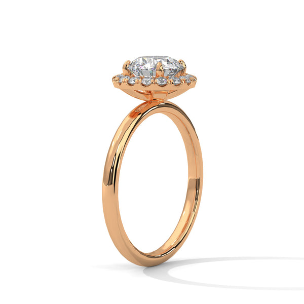 A classic round lab-grown diamond framed by a radiant halo — timeless brilliance with modern grace