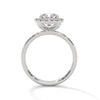 A soft cushion-shaped halo embraces a brilliant round lab-grown diamond — a romantic take on radiant sparkle.
