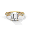 The Celestial Elegance Ring features a striking emerald-cut diamond embraced by a delicate band adorned with shimmering pave stones. A timeless piece that symbolizes everlasting love and sophistication.