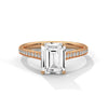 The Celestial Elegance Ring features a striking emerald-cut diamond embraced by a delicate band adorned with shimmering pave stones. A timeless piece that symbolizes everlasting love and sophistication.