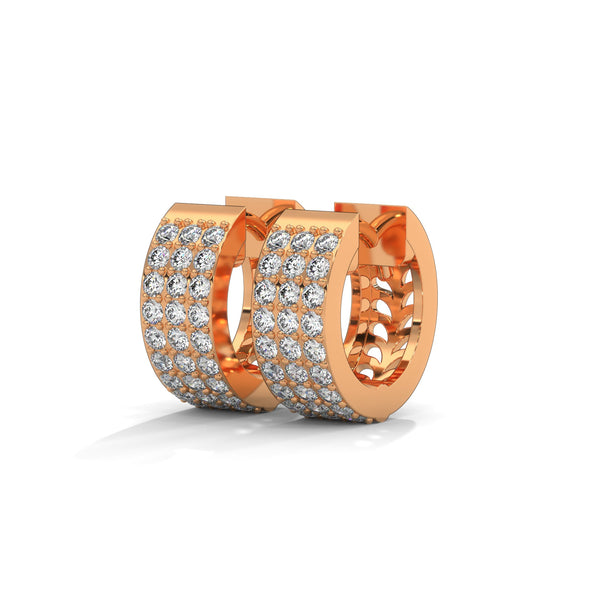 Elegant yellow gold huggie earrings adorned with three radiant rows of dazzling diamonds.
