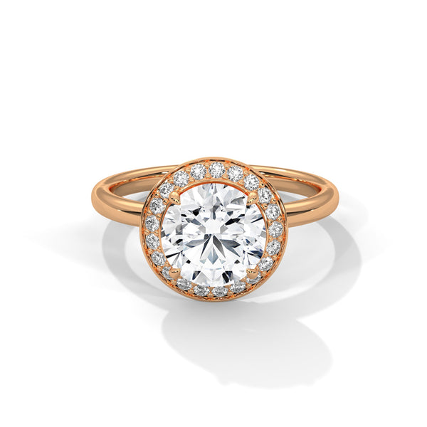“Celestial Halo Ring—round-cut brilliance, radiant halo sparkle, and white-gold elegance crafted to symbolize everlasting love, timeless beauty, and unforgettable engagements.”