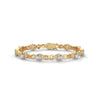 This exquisite tennis bracelet features 62 emerald-shaped diamonds, totaling 7.01 carats. With a 6.50-inch length, it is a stunning accessory that offers a perfect balance of brilliance and sophistication.